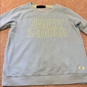 Light blue under armor crew neck .